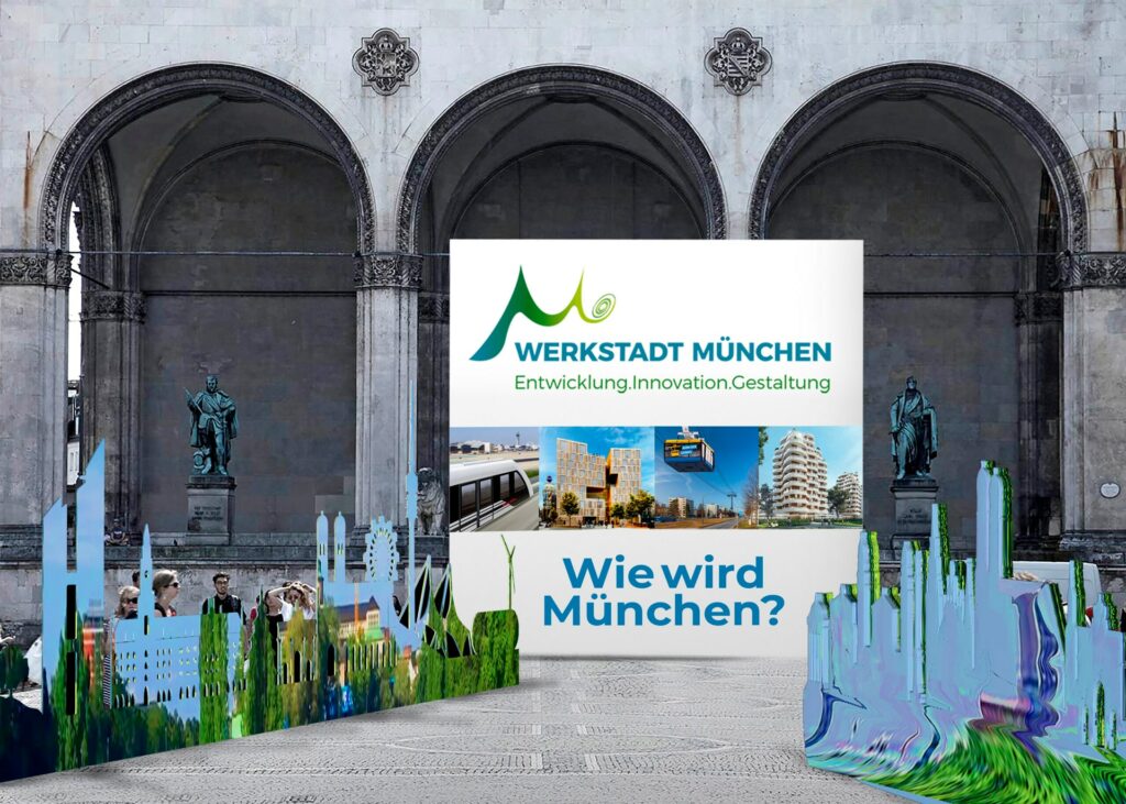 Plakat der Werkstadt München unf Aufsteller in der Form Münchner Sehenswürdigkeiten auf dem Münchner Odeonsplatz.